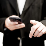 attorney-holding-cellphone-small